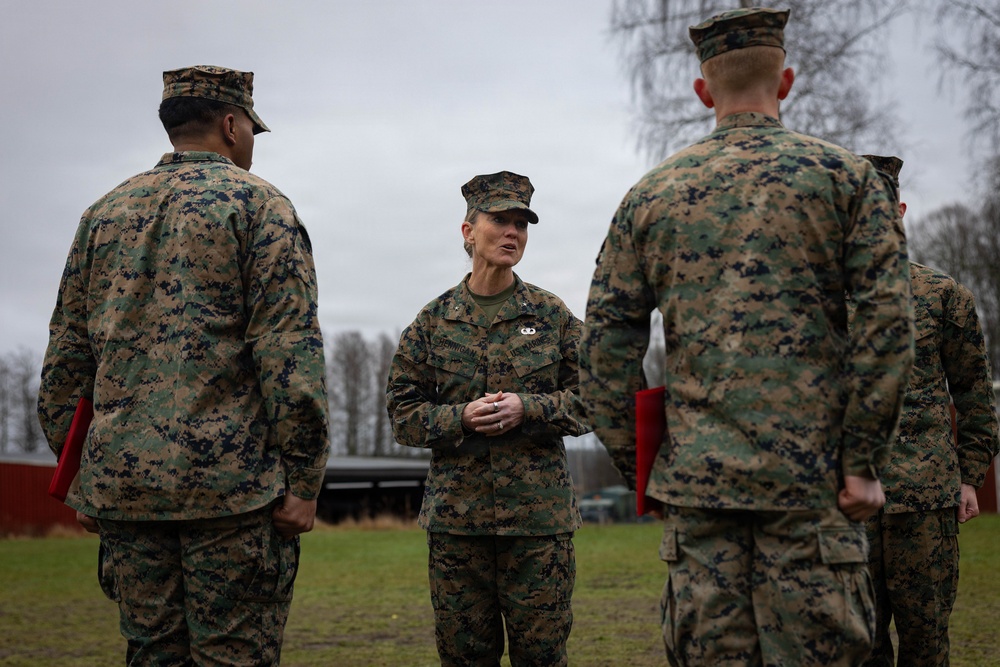 Two U.S. Navy Sailors awarded Fleet Marine Force pin and two Marines promote to Corporal while deployed