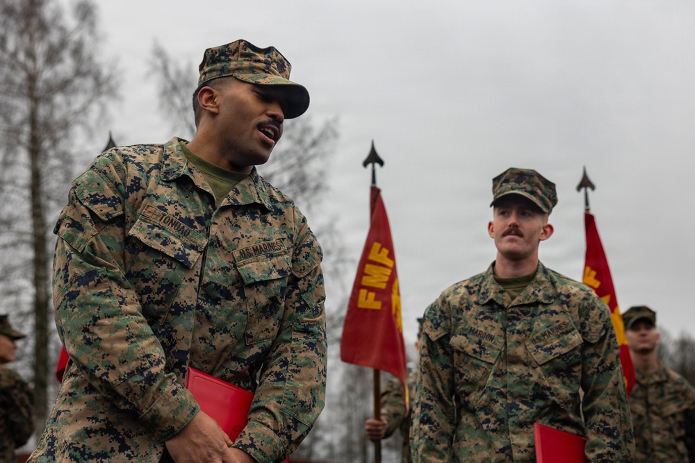 Two U.S. Navy Sailors awarded Fleet Marine Force pin and two Marines promote to Corporal while deployed