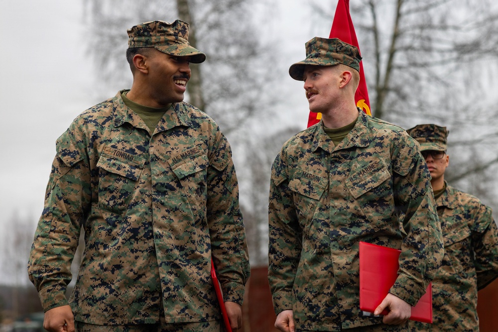 Two U.S. Navy Sailors awarded Fleet Marine Force pin and two Marines promote to Corporal while deployed