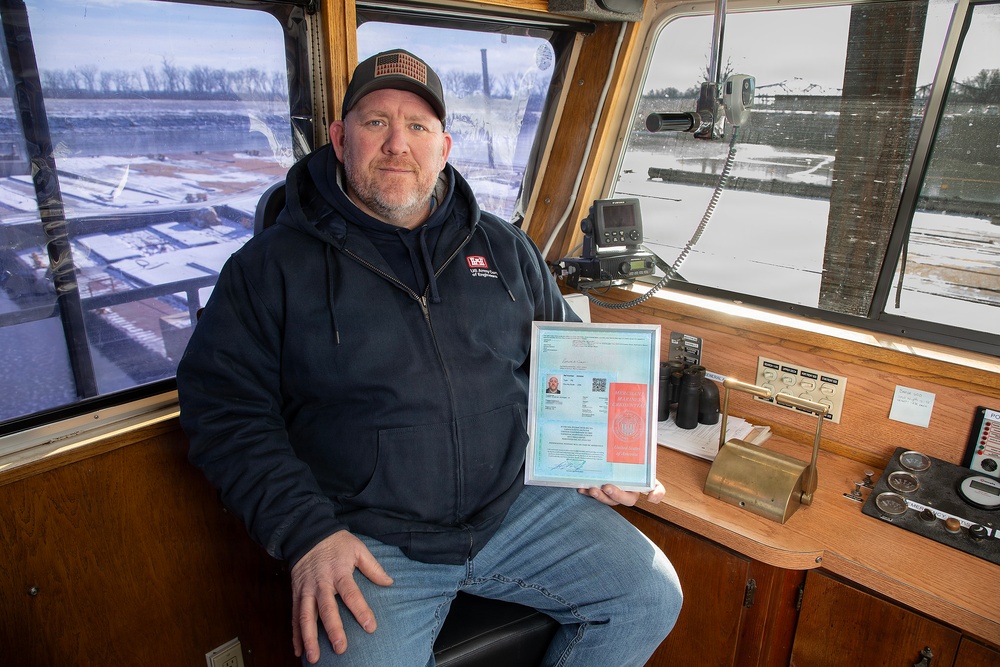 District employee charts final course toward master boat pilot license