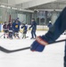 U.S. Coast Guard Academy cadets help train youth hockey team