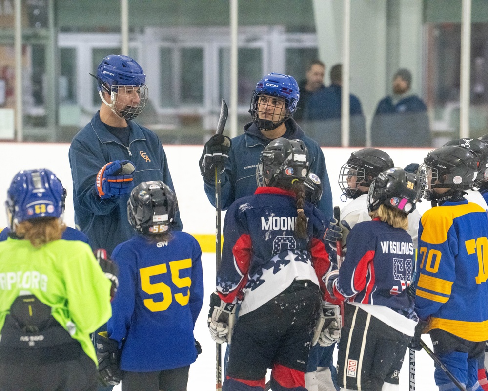 U.S. Coast Guard Academy cadets help train youth hockey team