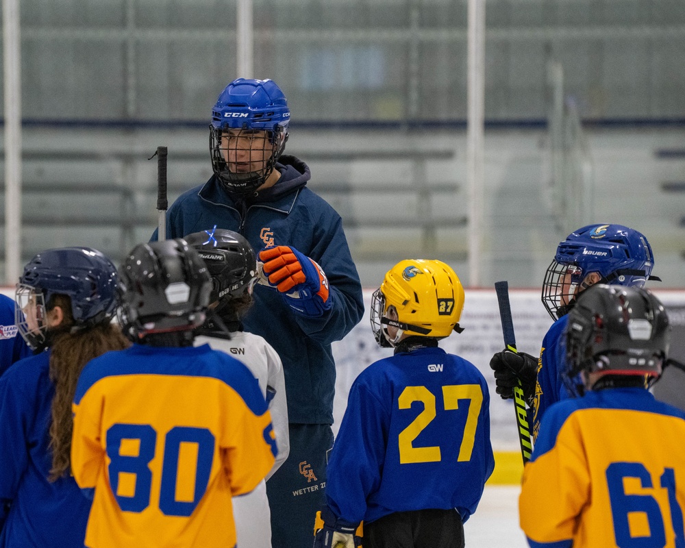 U.S. Coast Guard Academy cadets help train youth hockey team