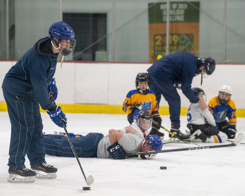 U.S. Coast Guard Academy cadets help train youth hockey team