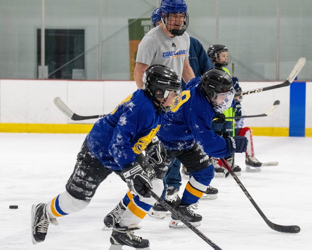 U.S. Coast Guard Academy cadets help train youth hockey team