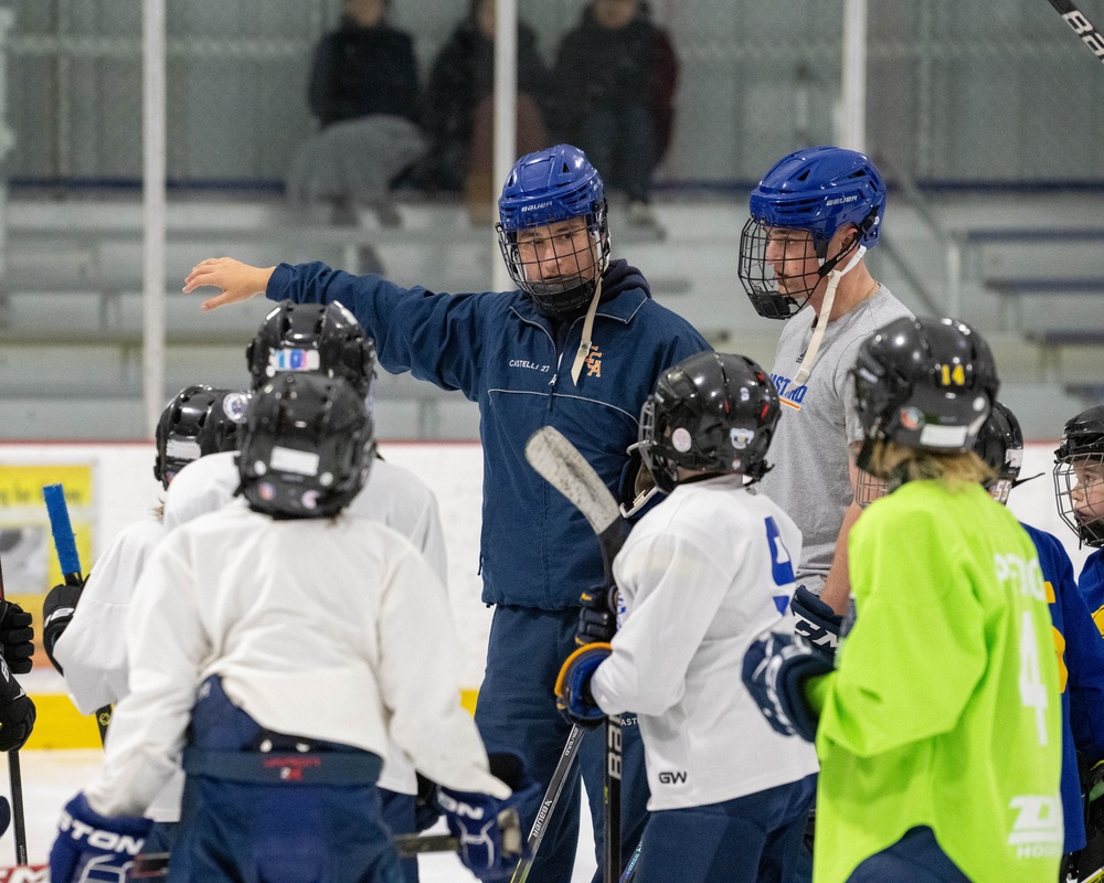 U.S. Coast Guard Academy cadets help train youth hockey team