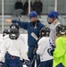 U.S. Coast Guard Academy cadets help train youth hockey team