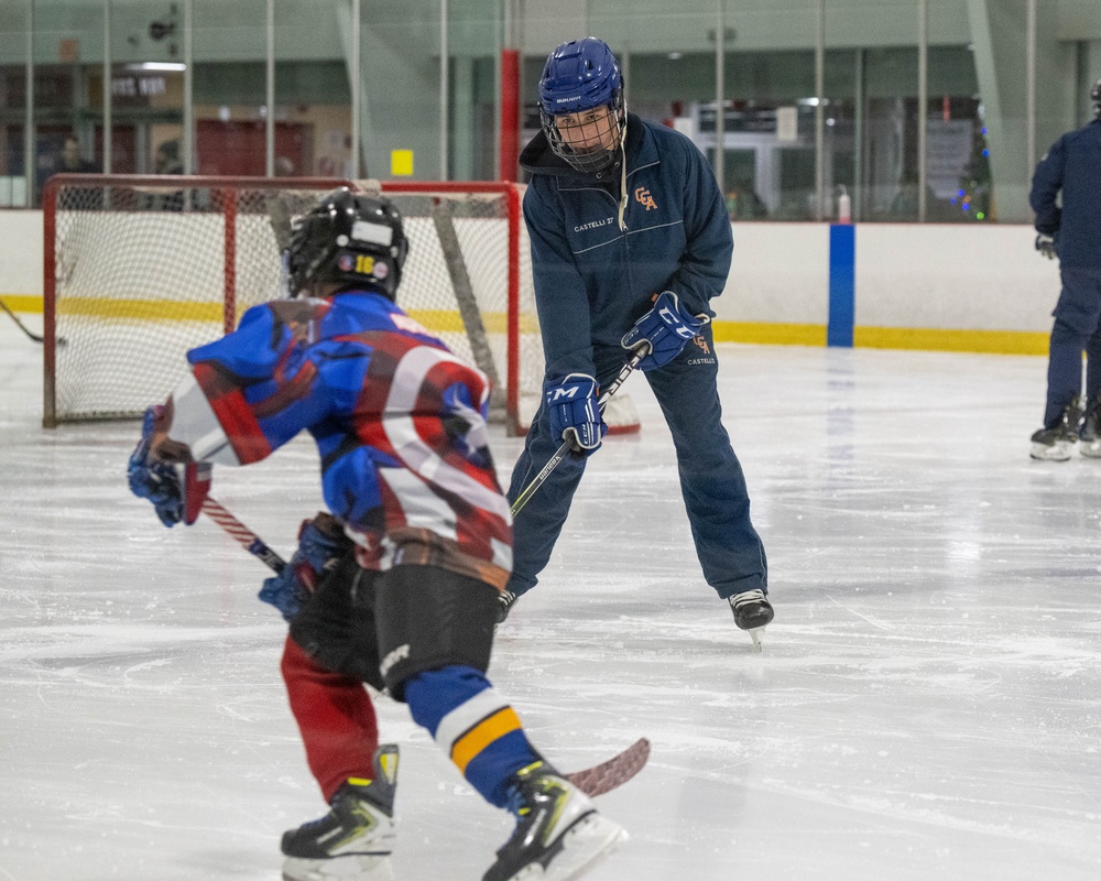 U.S. Coast Guard Academy cadets help train youth hockey team