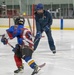 U.S. Coast Guard Academy cadets help train youth hockey team