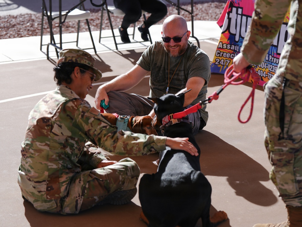 Paws Against Violence: Creech AFB Raises Awareness Through Community and Pets