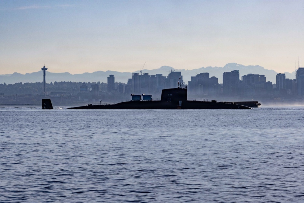The former USS Sam Rayburn (SSBN 635), now MTS Rayburn, departs Seattle for the final time.