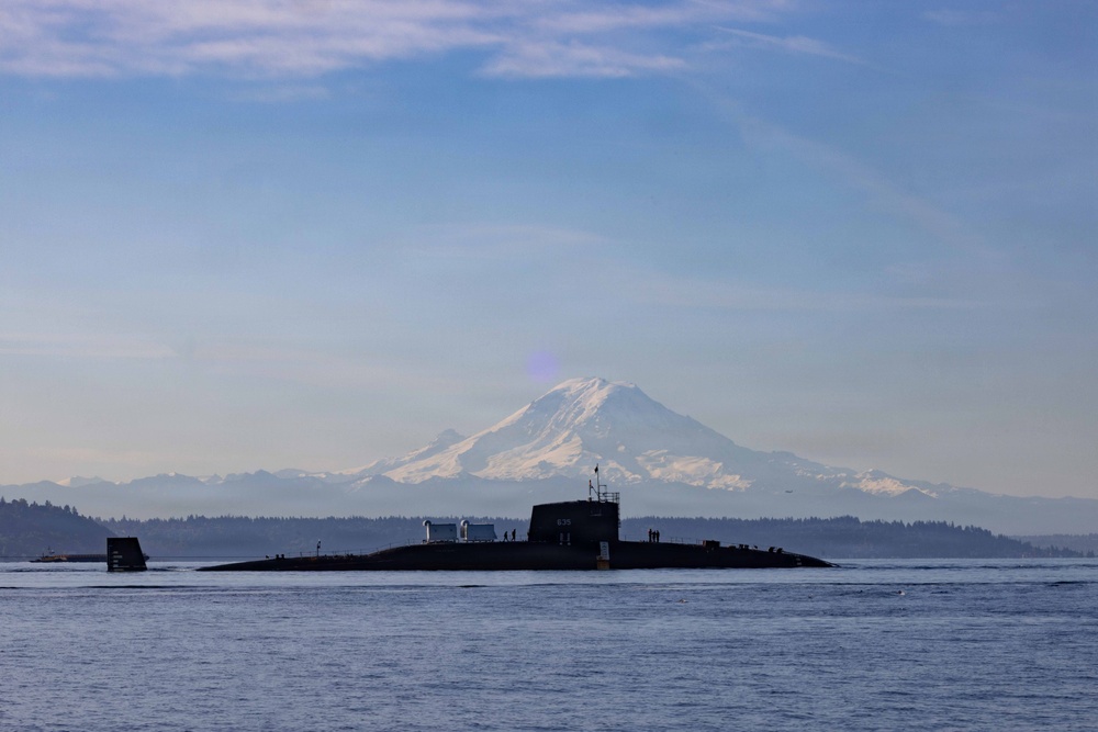 The former USS Sam Rayburn (SSBN 635), now MTS Rayburn, departs Seattle for the final time.