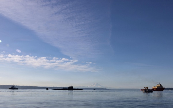 The former USS Sam Rayburn (SSBN 635), now MTS Rayburn, departs Seattle for the final time.