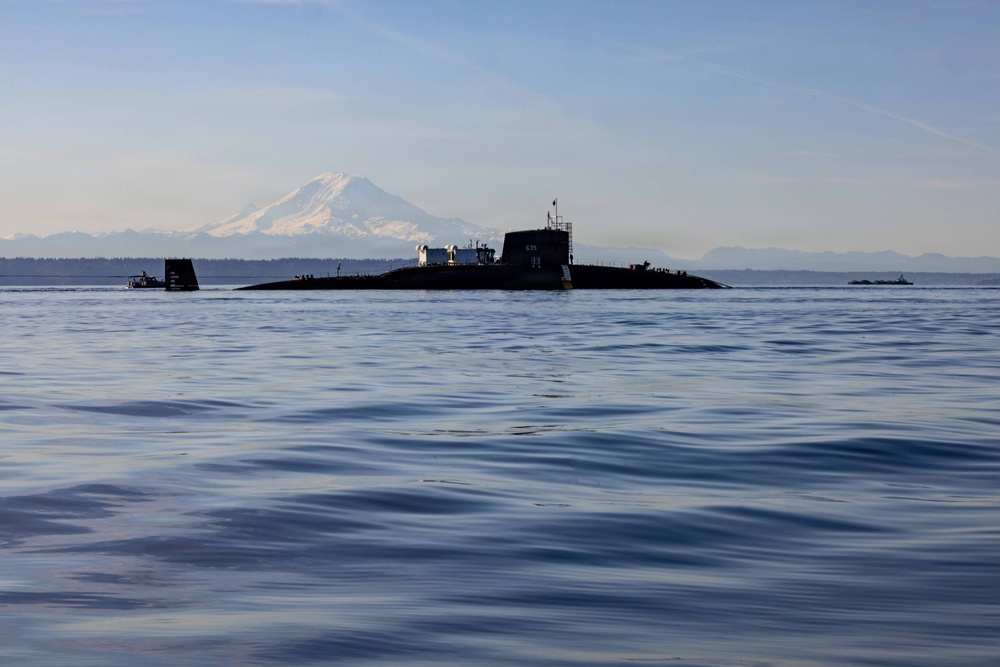 The former USS Sam Rayburn (SSBN 635), now MTS Rayburn, departs Seattle for the final time.