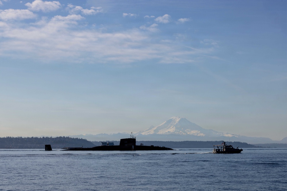 The former USS Sam Rayburn (SSBN 635), now MTS Rayburn, departs Seattle for the final time.