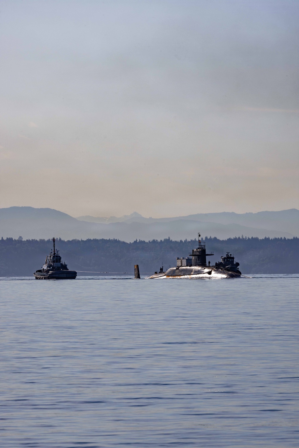 The former USS Sam Rayburn (SSBN 635), now MTS Rayburn, departs Seattle for the final time.