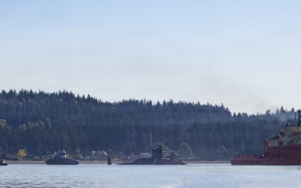 The former USS Sam Rayburn (SSBN 635), now MTS Rayburn, departs Seattle for the final time.