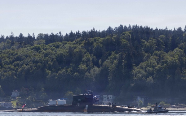 The former USS Sam Rayburn (SSBN 635), now MTS Rayburn, departs Seattle for the final time.