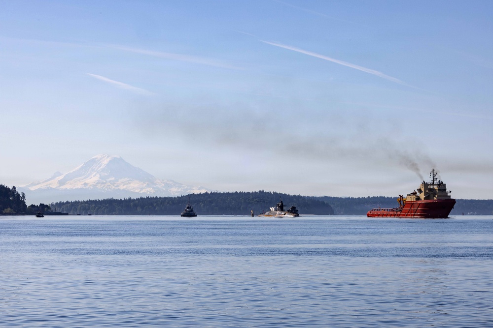 The former USS Sam Rayburn (SSBN 635), now MTS Rayburn, departs Seattle for the final time.