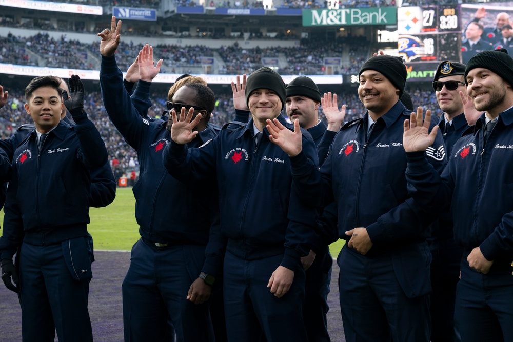 89th Airlift Wing conducts Ravens game flyover