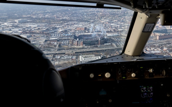 89th Airlift Wing conducts Ravens game flyover