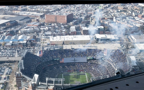 89th Airlift Wing conducts Ravens game flyover