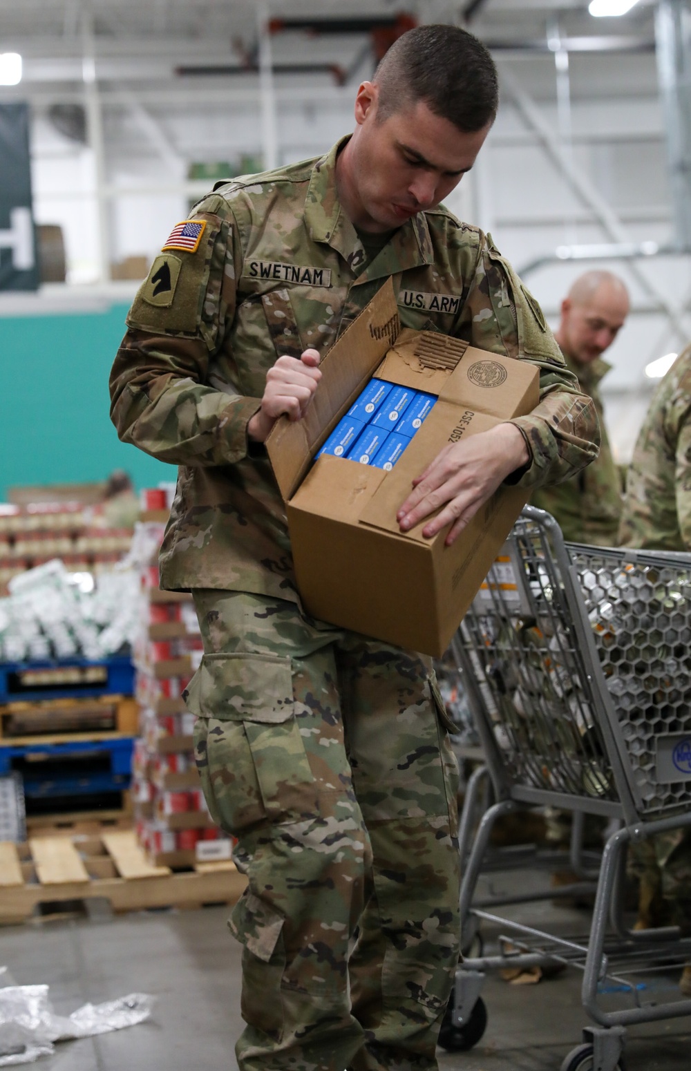 Guard Helps at Food banks