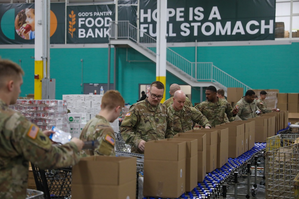 Guard Helps at Food bank