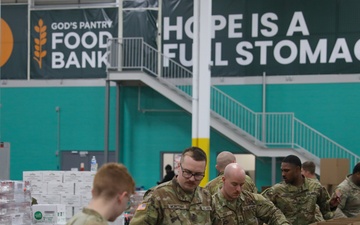 Guard Helps at Food bank