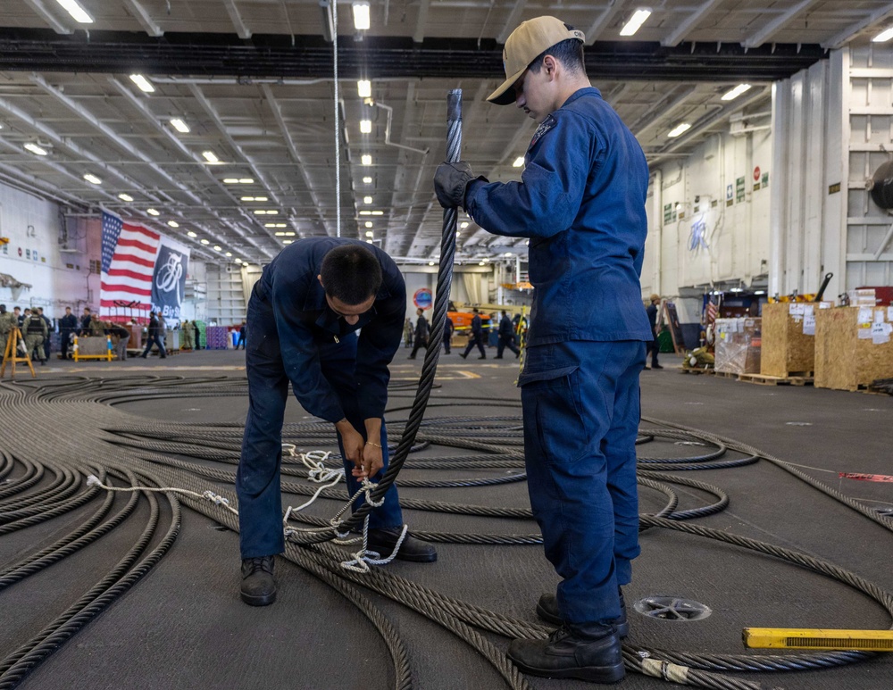 U.S. Navy Sailors Conduct Maintenance
