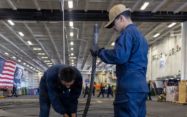U.S. Navy Sailors Conduct Maintenance