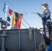 Sailor Shifts Colors During Port Transit Aboard USS Nimitz