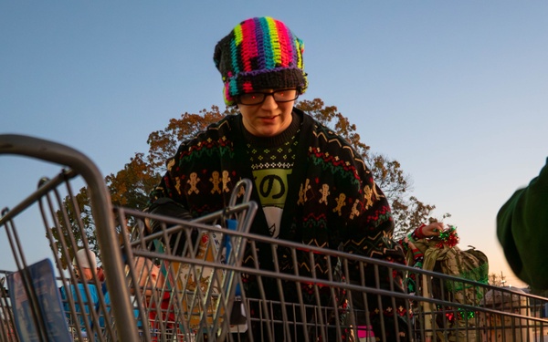 The First Team donates toys for Operation Holiday Cheer