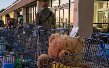 The First Team donates toys for Operation Holiday Cheer
