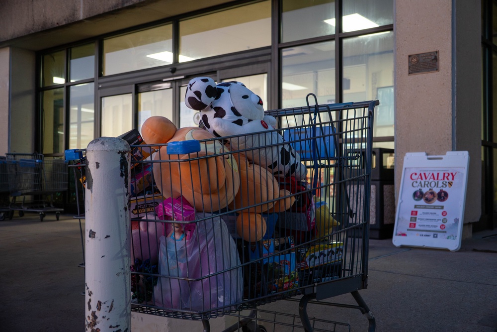 The First Team donates toys for Operation Holiday Cheer
