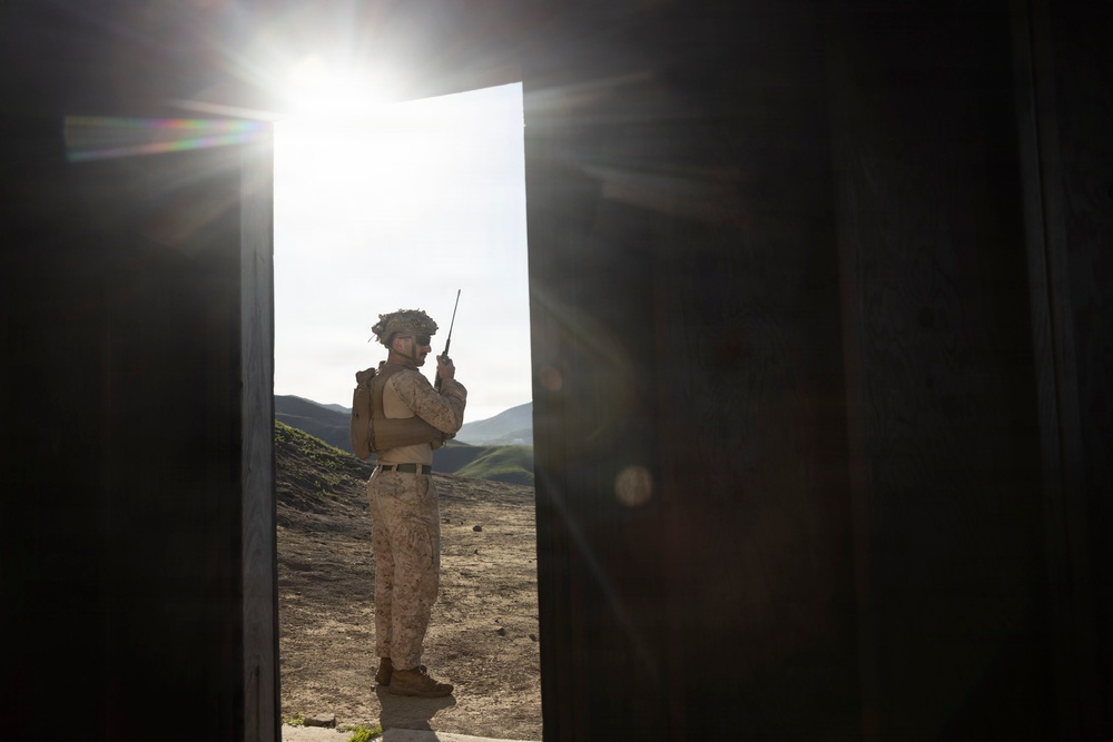 U.S. Marines with FSB, 11th Marines call in close air support with HMLA-367
