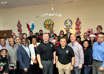 Top ASC leaders attend 405th AFSB holiday event as special guests before visiting APS-2 sites