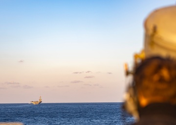 USS Dewey Completes a Replenishment-at-Sea with USS George Washington