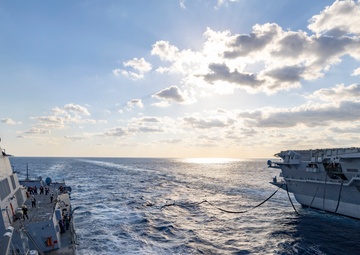USS Dewey Completes a Replenishment-at-Sea with USS George Washington