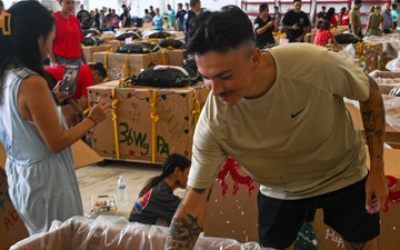 Operation Christmas Drop 2025 begins: Service members, families, volunteers flock to Andersen to support