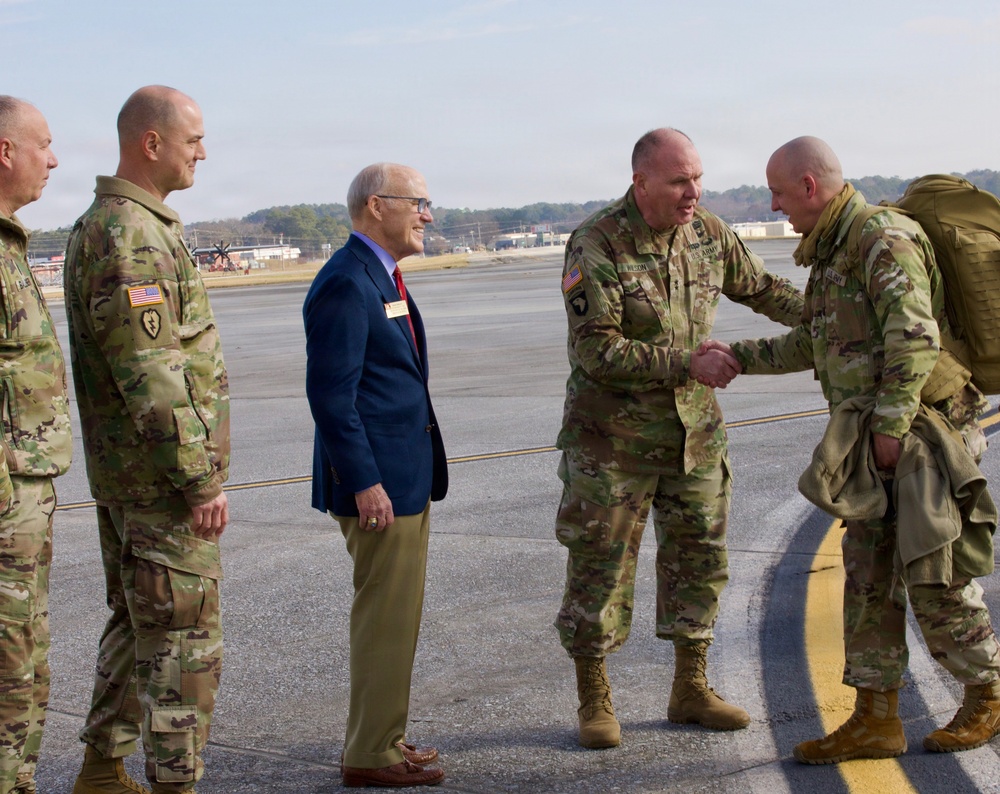 Adjutant General of Georgia shakes hands with Soldier
