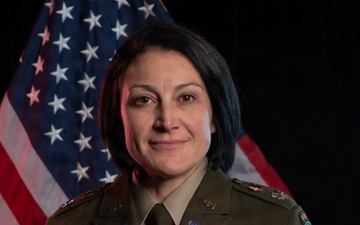 Lt. Col. Lauren Sharpless poses for her official photo