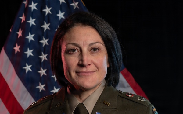 Lt. Col. Lauren Sharpless poses for her official photo