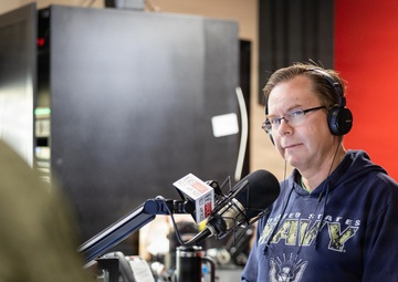 NETC Commander Rear Adm. Gregory Huffman conducts radio interview with NewsRadio 92.3