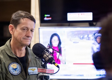 NETC Commander Rear Adm. Gregory Huffman conducts radio interview with NewsRadio 92.3