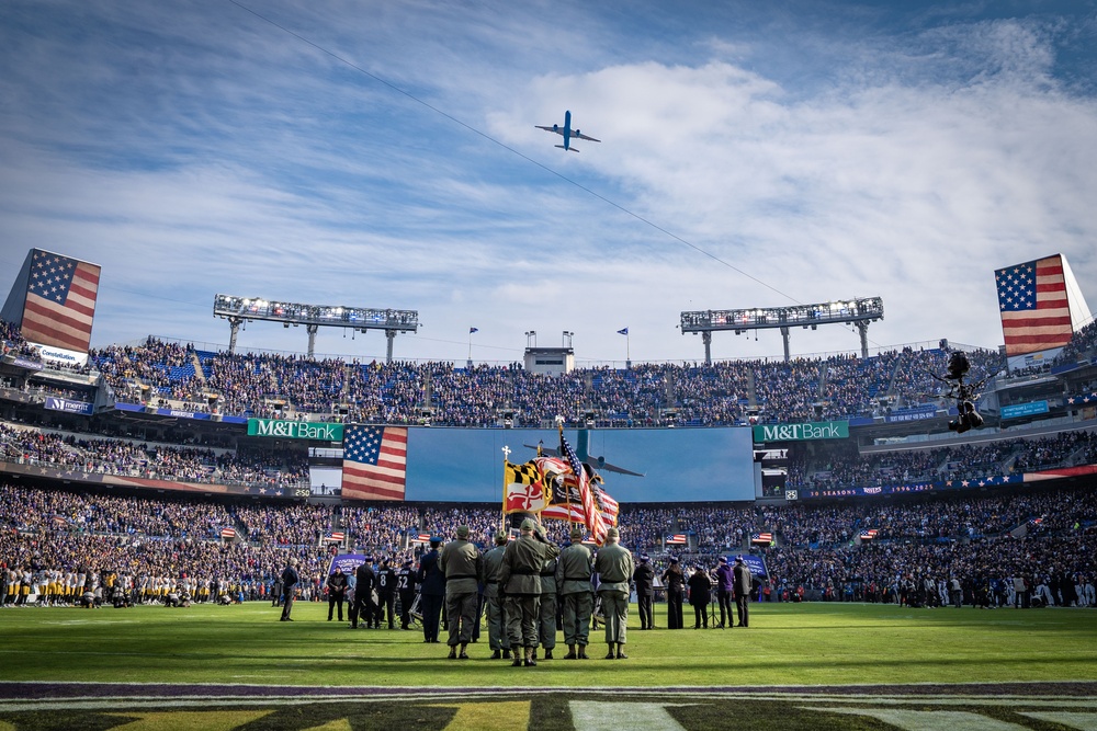 89th Airlift Wing conducts Ravens game flyover