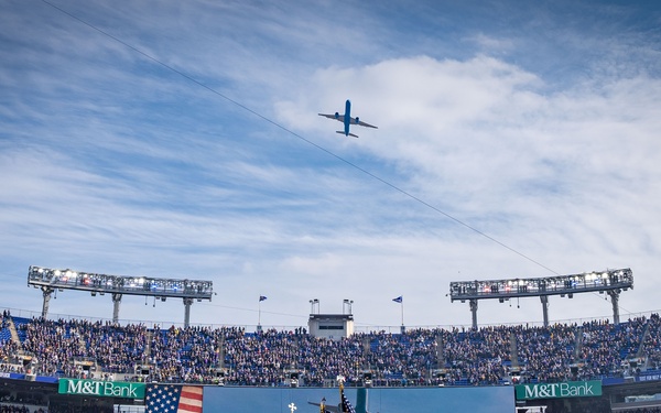 89th Airlift Wing conducts Ravens game flyover