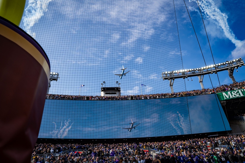 89th Airlift Wing conducts Ravens game flyover