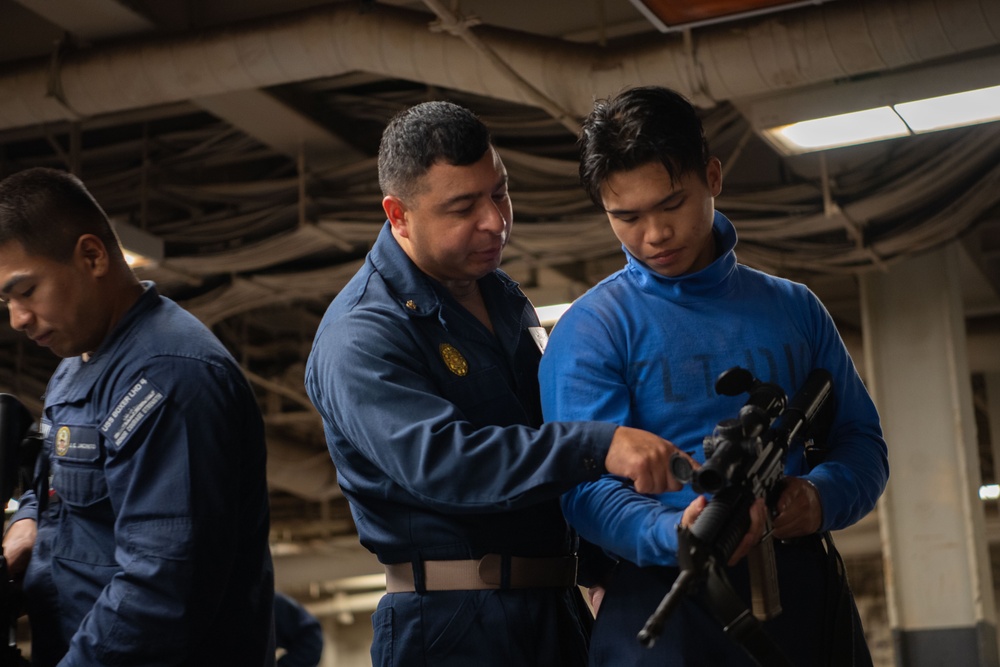 Boxer Sailors conducts weapons familiarization