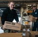 U.S. Navy Sailors Move Supplies